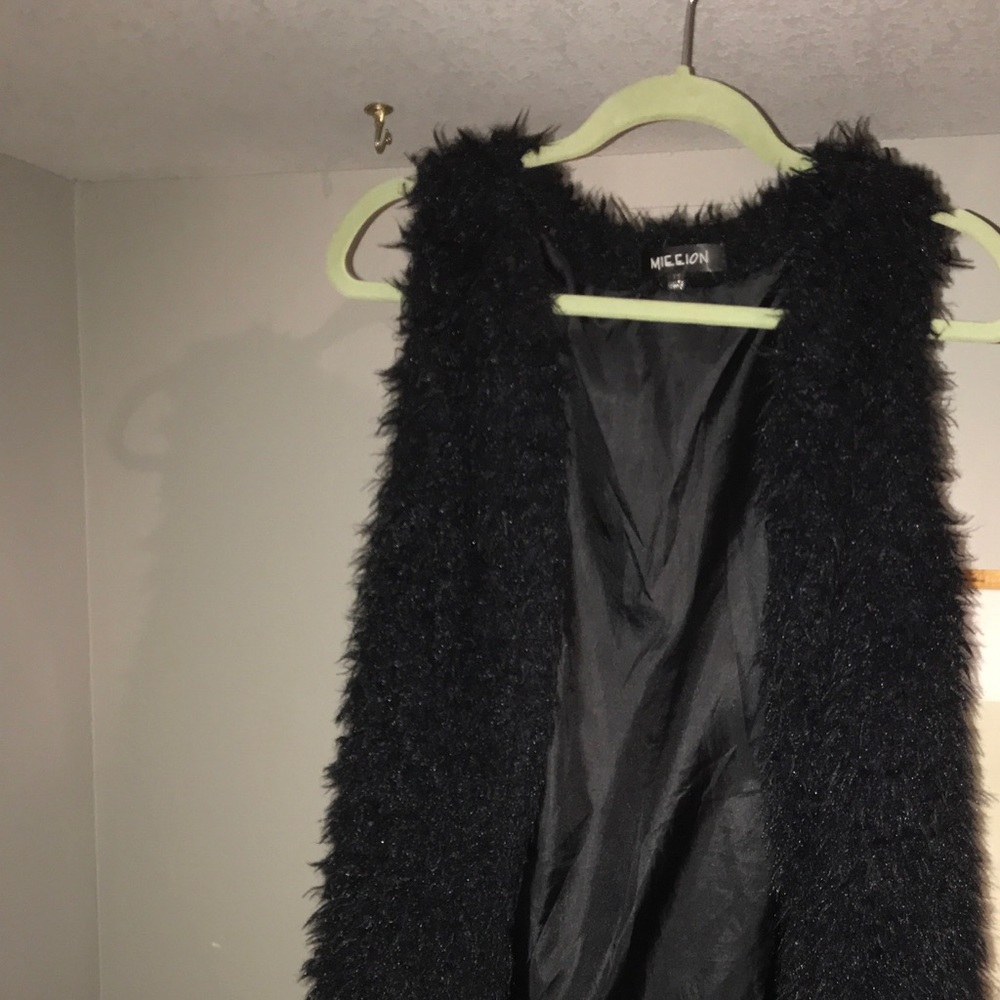 Black faux fur vest